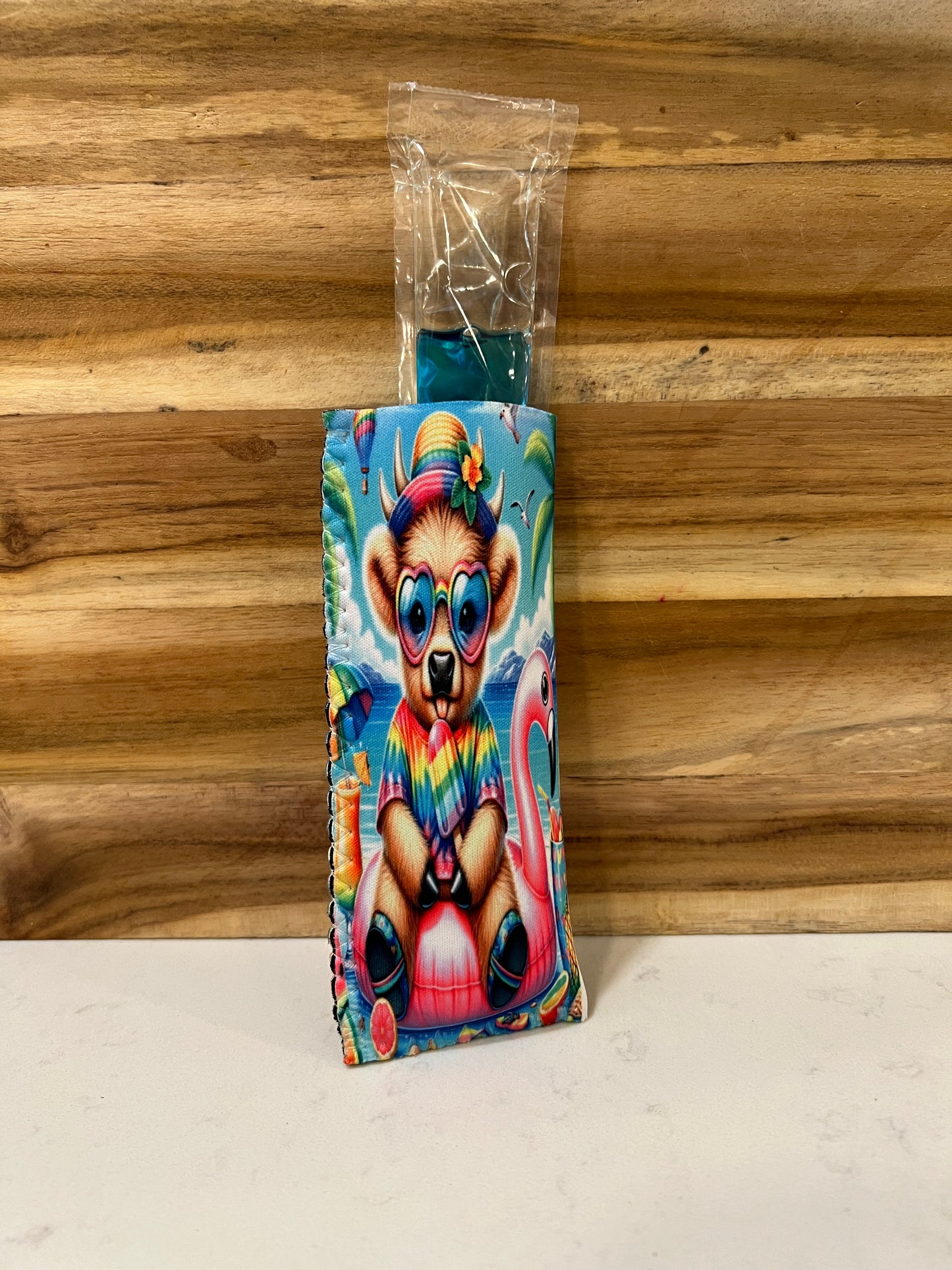 Colorful Highland cow sitting on a flamingo floatie Neoprene popsicle holders
