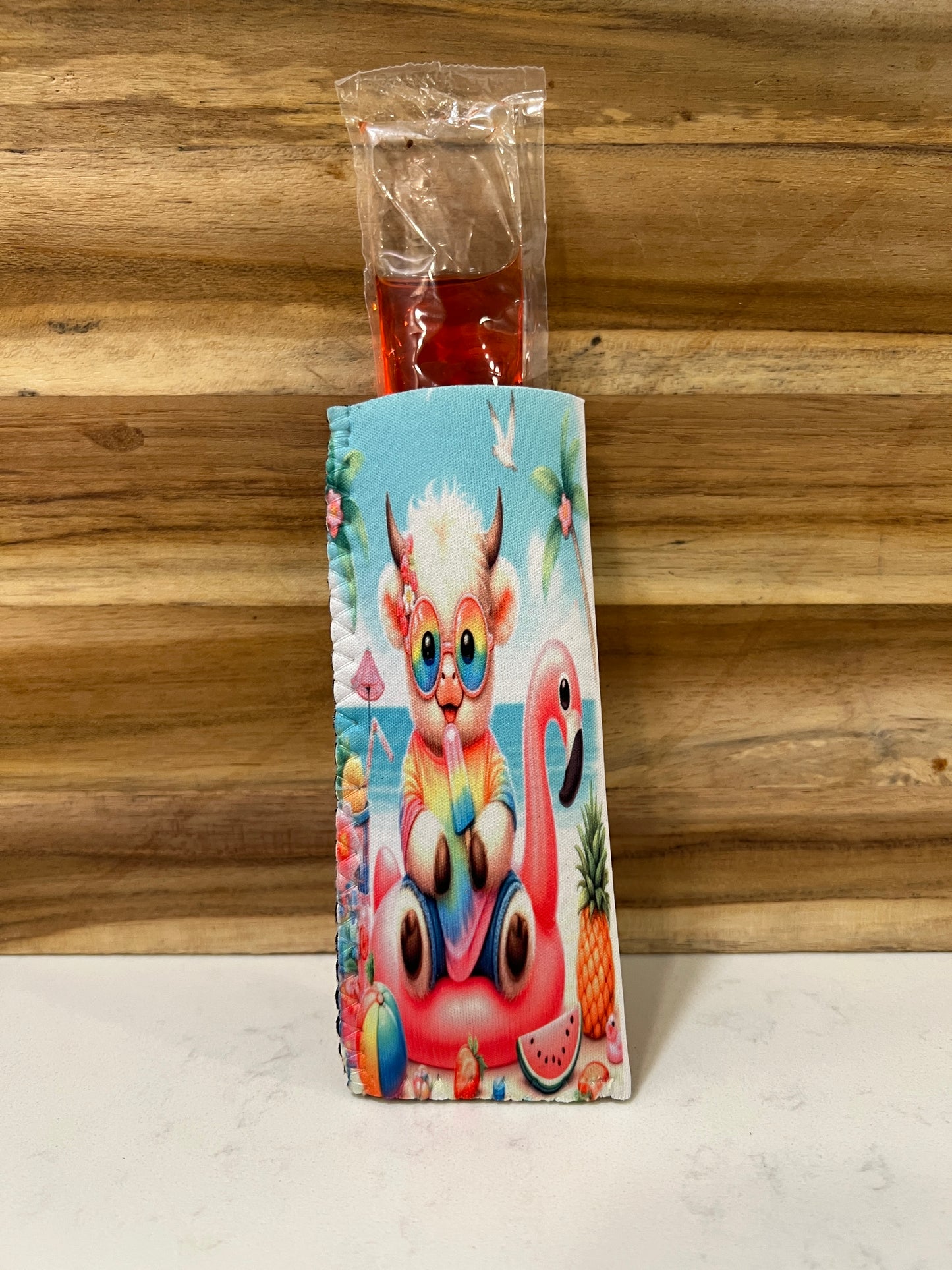 light Highland Cow with a popsicle sitting on a flamingo floatie Neoprene popsicle holders
