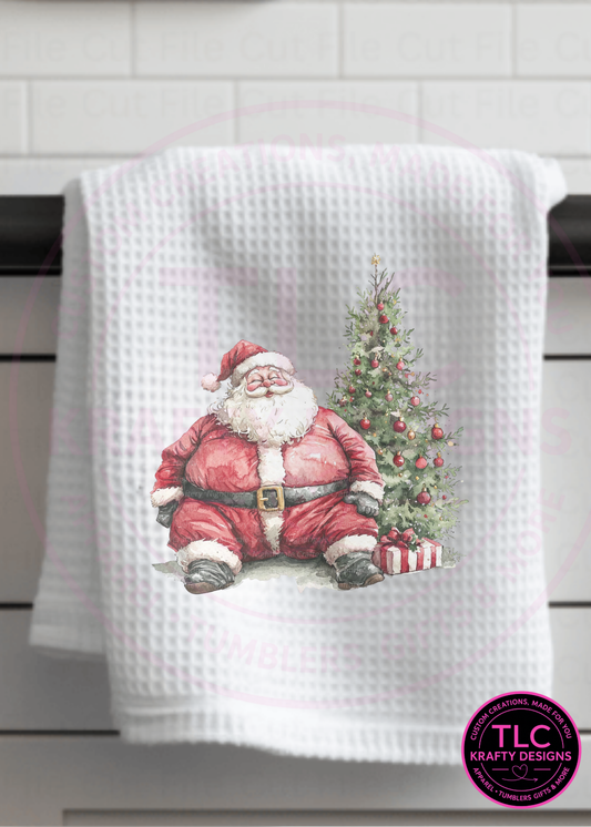 Santa Resting by the Christmas Tree – Festive Holiday Kitchen Towel