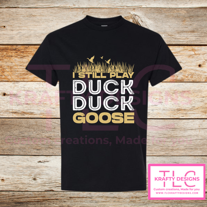 I Still Play Duck Duck Goose Shirt – Funny Hunting & Outdoor Graphic Tee