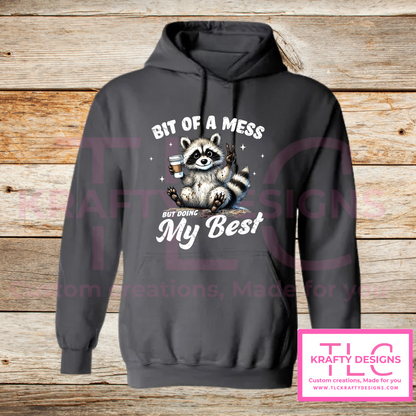 Bit of a Mess But Doing My Best – Funny Raccoon Crew Neck or Hoodie