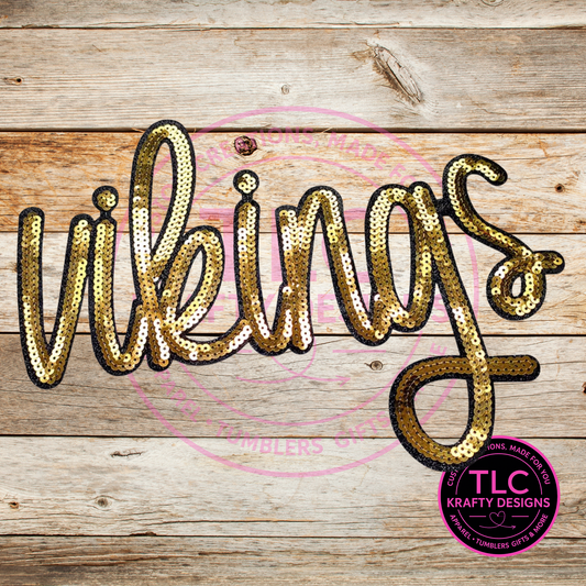 Sequined 'Vikings' text on a wooden background with TLC Krafty Designs logo.