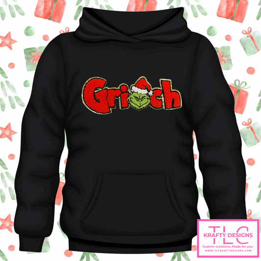 🎄 Green Man Holiday Hoodie – Classic Red Chenille Patch with Sequin Border (S–4XL)