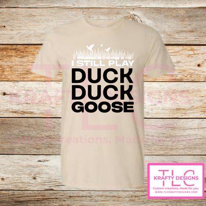 I Still Play Duck Duck Goose Shirt – Funny Hunting & Outdoor Graphic Tee