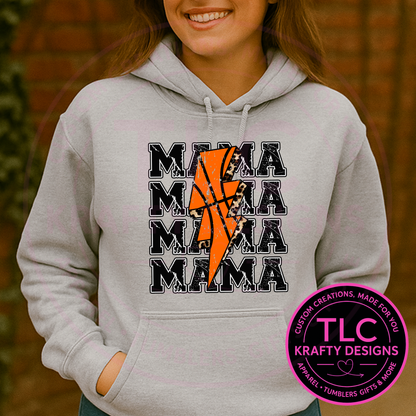 Person wearing a gray hoodie with 'MAMA' text and basketball design, with TLC Krafty Designs logo.