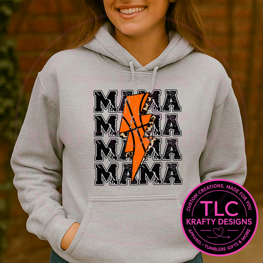 Person wearing a gray hoodie with 'MAMA' text and basketball design, with TLC Krafty Designs logo.