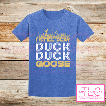 I Still Play Duck Duck Goose Shirt – Funny Hunting & Outdoor Graphic Tee