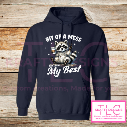 Bit of a Mess But Doing My Best – Funny Raccoon Crew Neck or Hoodie