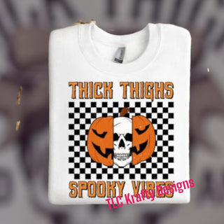 Thick Thighs and Spooky Vibes (Checkerboard Pumpkin Skull) unisex T-Shirt
