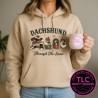 Dachshund Through The Snow design on a sand hoodie