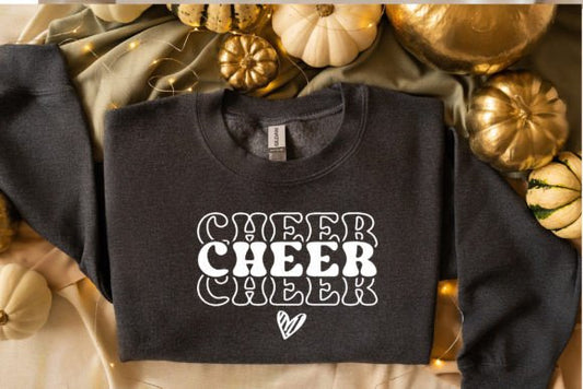 Cozy sweatshirt featuring the word "Cheer" boldly written across it