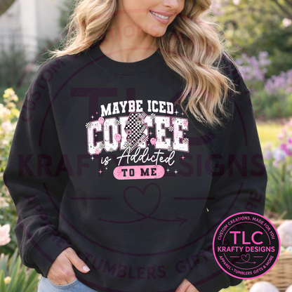 Person wearing a black sweatshirt with text in an outdoor setting