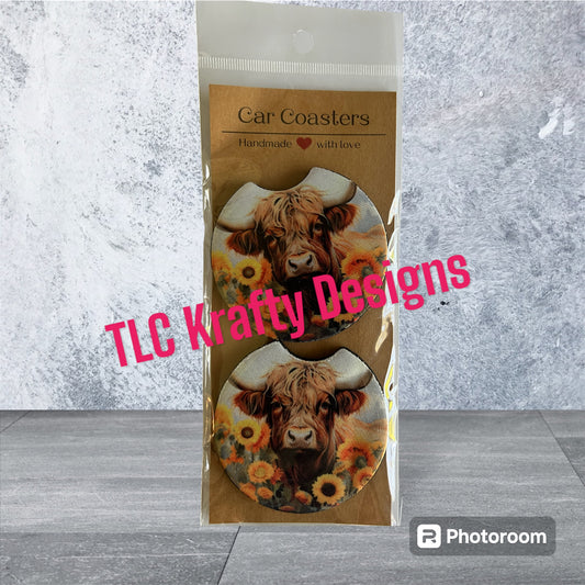 Highland cow surrounded by a bed of flowers neoprene 2.75" Car Coasters