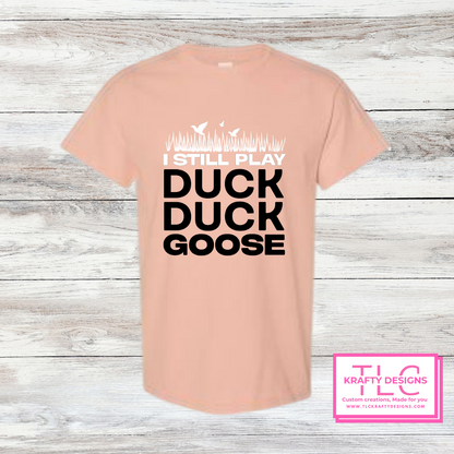 I Still Play Duck Duck Goose Shirt – Funny Hunting & Outdoor Graphic Tee