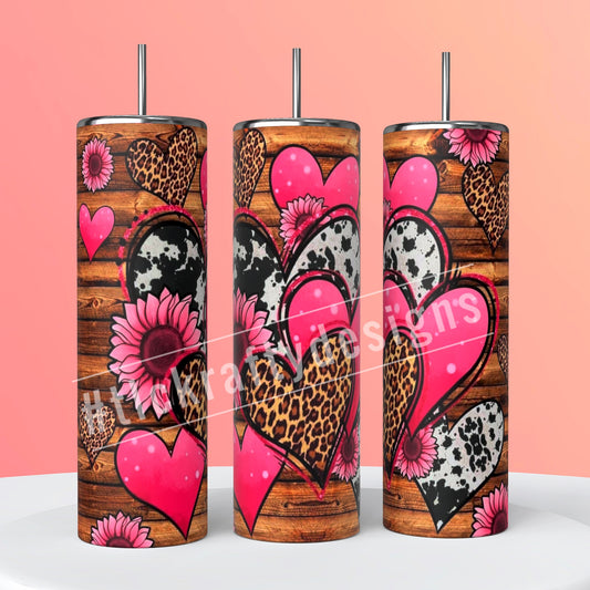 Rustic Sublimation 20oz. Skinny tumbler with a rustic wood background with stylish cow and leopard print hearts