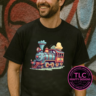 Cute cartoon train design — colorful teal and coral locomotive on a black tee