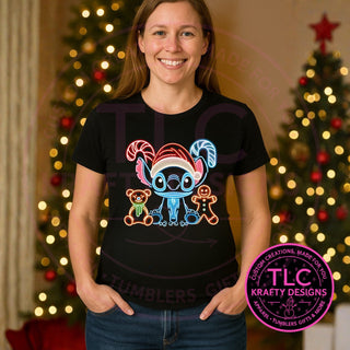 Blue Monster Christmas neon design on a black tee
