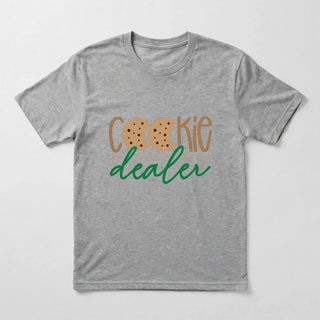 CK1 Cookie Dealer script design flat-lay on Sport Grey tee