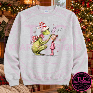 Green Man booping a little girl design on an Ash crewneck sweatshirt