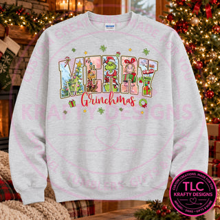 Merry Green Man Christmas Letters design on an Ash crewneck sweatshirt
