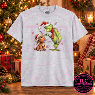 Green Man booping a Highland cow design on an Ash t-shirt