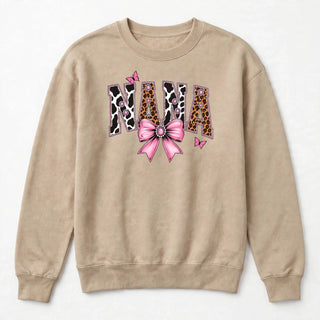 NANA cow print varsity design on sand sweatshirt