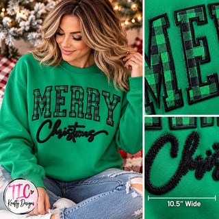 Merry fuzzy patch on green crewneck sweatshirt