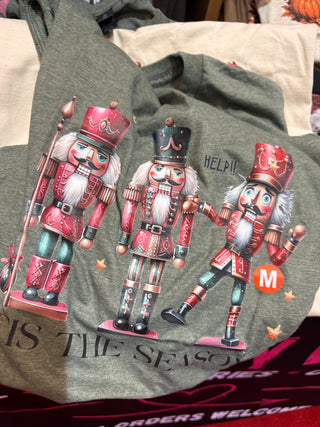 Nutcracker design on a Heathered Military Green shirt