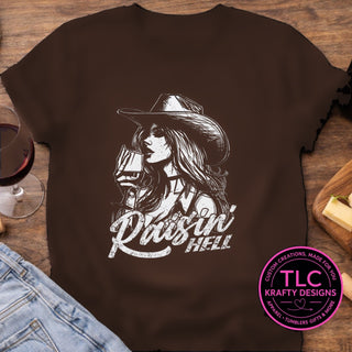 Raisin Hell Cowgirl design mockup on dark chocolate brown t-shirt