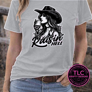 Raisin Hell Cowgirl design mockup on gravel gray t-shirt