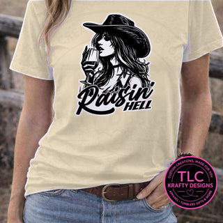 Raisin Hell Cowgirl design mockup on heathered oatmeal t-shirt