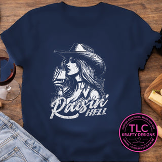 Raisin Hell Cowgirl design mockup on navy t-shirt