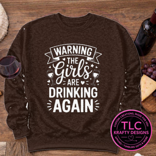 Warning The Girls Are Drinking Again design mockup on dark chocolate brown sweatshirt